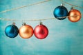 Colored Christmas balls hanging on blue background Royalty Free Stock Photo