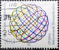 Colored circles that form a globe, for the125 years of the International Telecommunication Union