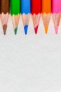 Colored close up pencils on white background. Royalty Free Stock Photo