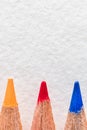 Colored close up pencils on white background. Royalty Free Stock Photo