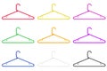 Colored clothes hangers isolated on a white background