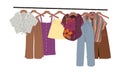 Colored clothes hanging on hangers on rack vector. Royalty Free Stock Photo