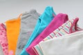 Colored clothes on a white background Royalty Free Stock Photo