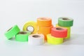 Colored commercial stickers in rollers. double scotch tape. Royalty Free Stock Photo