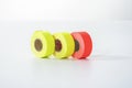 Colored commercial stickers in rollers. double scotch tape. Royalty Free Stock Photo