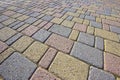 Colored concrete self locking flooring blocks assembled on a substrate of sand - type of flooring permeable to rain water as