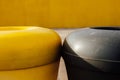 Colored containers in the city, black and yellow