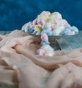 colored cotton balls on a blue background Royalty Free Stock Photo