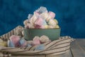 colored cotton balls on a blue background Royalty Free Stock Photo