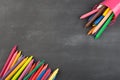 colored crayons on the blackboard