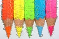 Colored crayons with bubbles Royalty Free Stock Photo