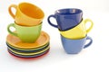 Colored cups and plates Royalty Free Stock Photo