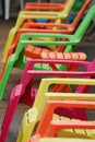 Colored Deck Chairs Pool-Side in a Row Royalty Free Stock Photo