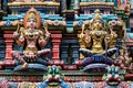 Colored decorations and statues, Hindu temple, Bangkok. Royalty Free Stock Photo