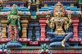 Colored decorations and statues, Hindu temple, Bangkok. Royalty Free Stock Photo