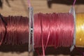 colored decorative silk ordos on spools for creativity