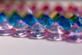 Colored diamonds arranged in a row Royalty Free Stock Photo