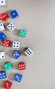 colored dice framing the side of a neutral surface Royalty Free Stock Photo