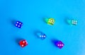 colored dices showing number six on colored background. Free copy space. Concept of game, winning combination. Colored playing