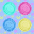 colored dinner plates on heart tablecloth