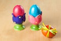 Colored easter eggs in egg cups Royalty Free Stock Photo