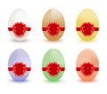 Colored easter eggs with red bows and ribbons. Royalty Free Stock Photo