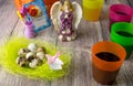 Colored Easter eggs table decoration with angel Royalty Free Stock Photo