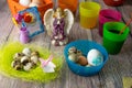 Colored Easter eggs table decoration with angel Royalty Free Stock Photo