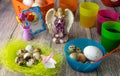 Colored Easter eggs table decoration with angel Royalty Free Stock Photo