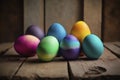Colored Easter Eggs Wooden Table. Generative AI Royalty Free Stock Photo