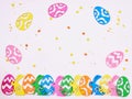 Easter composition. Colored eggs composition flat lay on white background, close up Royalty Free Stock Photo