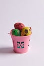 colored eggs for Easter in a bucket Royalty Free Stock Photo
