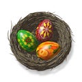 Colored eggs by Easter in a nest