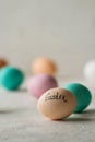 Colored eggs and the inscription Easter Royalty Free Stock Photo