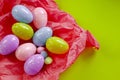 Colored eggs and small fluffy clumps as a symbol of Easter. eggs made of foamiran.