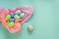 Colored eggs and small fluffy clumps as a symbol of Easter. eggs made of foamiran.