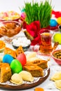 Colored eggs, wheat springs and sweet pastry for Novruz Holiday in Azerbaijan Royalty Free Stock Photo