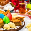 Colored eggs, wheat springs and sweet pastry for Nowruz Holiday in Azerbaijan Royalty Free Stock Photo