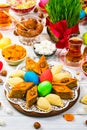 Colored eggs, wheat springs and sweet pastry for Novruz Holiday in Azerbaijan Royalty Free Stock Photo
