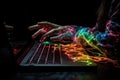 Colored energy envelops hand on laptop, symbolizing global networking.