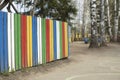 Colored fence in garden. Children's fence. Colorful board Royalty Free Stock Photo