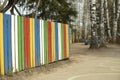 Colored fence in garden. Children's fence. Colorful board Royalty Free Stock Photo