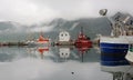 Norway - Honningsvag Harbour - Colored fishing boats with fog Royalty Free Stock Photo