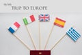 Colored flags of countries: France, Italy, England UK, Spain, Greece, travel plan. Poster with sign Royalty Free Stock Photo