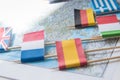 Colored flags of Europian countries on a map: France, Italy, England UK, Spain, Greece, travel destination planning concept Royalty Free Stock Photo