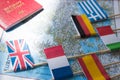 Colored flags of Europian countries on a map: France, Italy, England UK, Spain, Greece, travel destination planning concept Royalty Free Stock Photo