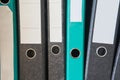 Colored folders for office files and paper on a shelf. Background image Royalty Free Stock Photo