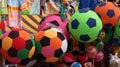 Colored footballs in a shop