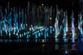 A colored fountain with illumination at night. A fabulous fountain. Background.