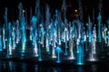 A colored fountain with illumination at night. A fabulous fountain. Background.